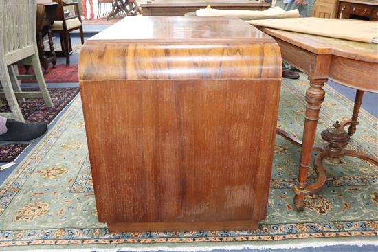 An Art Deco figured walnut desk W.109cm